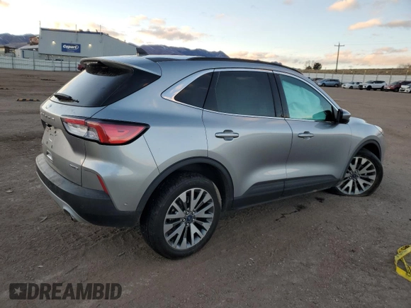 2021 Ford Escape Titanium with VIN 1FMCU9J97MUA70995, listed as a Copart auction lot 87004884 with Not Provided miles and Salvage Title. Bid and sale history available at carsss.com. Image 3.