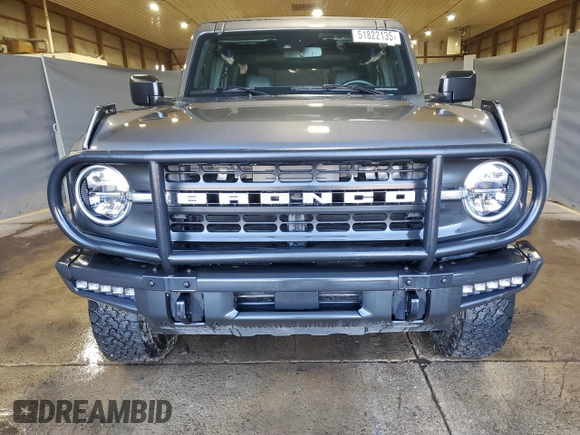 2021 Ford Bronco z VIN 1FMEE5DHXMLA92853, wystawiony jako Copart lot #51822135 z przebiegiem 34 894 mil mil oraz Szkoda całkowita • Salvage title. Historia ofert i sprzedaży dostępna na DreamBid. Obrazek 5.