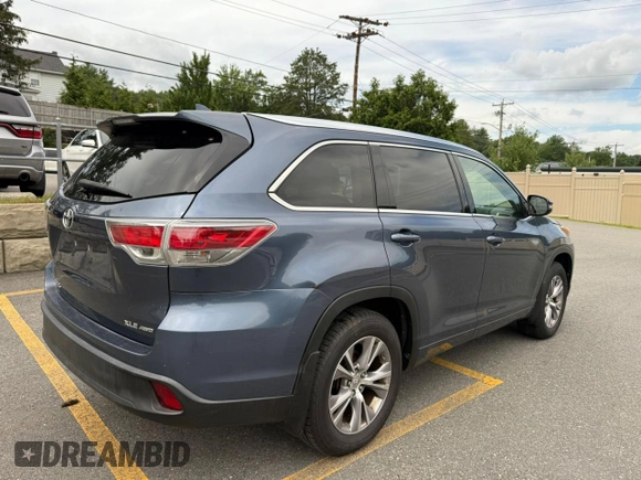 2015 Toyota Highlander XLE with VIN 5TDJKRFH2FS201565, listed as a Copart auction lot 63618945 with 173,689 mi miles and Clean title. Bid and sale history available at DreamBid. Image 3.