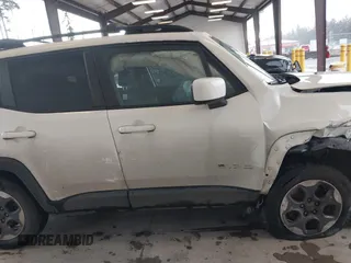 2015 Jeep Renegade Latitude with VIN ZACCJBBH7FPB51994, listed as a IAAI auction lot 41658051 with 95,580 mi miles. Bid and sale history available at carsss.com. Image 14.