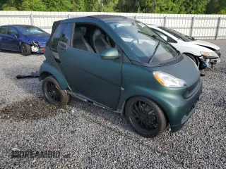 2009 Smart fortwo Passion z VIN WMEEK31X89K289001, wystawiony jako Copart lot #51781925 z przebiegiem 79 742 mil mil oraz Szkoda całkowita • Salvage title. Historia ofert i sprzedaży dostępna na DreamBid. Obrazek 4.