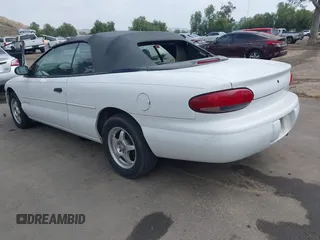 1998 Chrysler Sebring JX with VIN 3C3EL45HXWT262448, listed as a IAAI auction lot 42024888 with 93,913 mi miles and . Bid and sale history available at DreamBid. Image 3.