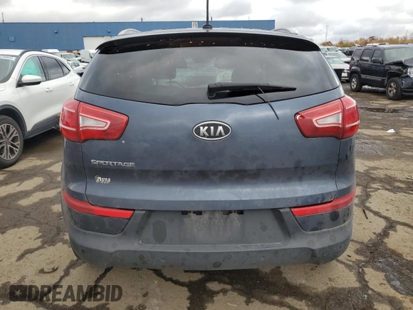 2012 Kia Sportage LX z VIN KNDPBCA28C7206947, wystawiony jako Copart lot #74242323 z przebiegiem Nie podano mil oraz Szkoda całkowita • Salvage title. Historia ofert i sprzedaży dostępna na DreamBid. Obrazek 6.