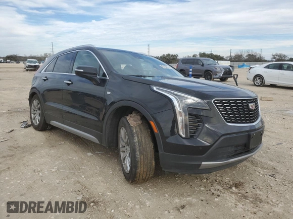 2022 Cadillac XT4 FWD Premium Luxury z VIN 1GYFZCR42NF135325, wystawiony jako Copart lot #43133215 z przebiegiem 48 998 mil mil oraz Szkoda całkowita • Salvage title. Historia ofert i sprzedaży dostępna na DreamBid. Obrazek 4.