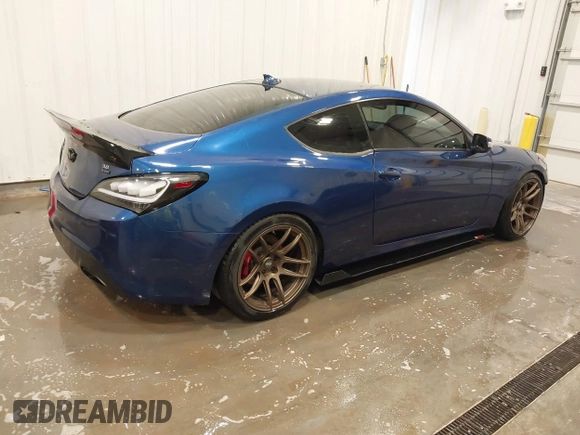 2016 Hyundai Genesis Coupe R-Spec z VIN KMHHU6KJ2GU134961, wystawiony jako IAAI lot #41902014 z przebiegiem 82 384 mil mil oraz . Historia ofert i sprzedaży dostępna na DreamBid. Obrazek 4.