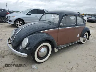1956 Volkswagen Beetle with VIN 1226101, listed as a Copart auction lot 74739324 with 34,472 mi miles and Salvage Title. Bid and sale history available at DreamBid. Image 1.