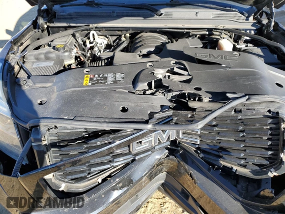2018 GMC Yukon Denali with VIN 1GKS2CKJ3JR404177, listed as a Copart auction lot 82577354 with 129,744 mi miles and Salvage Title. Bid and sale history available at carsss.com. Image 12.