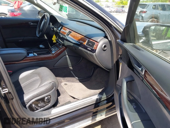 2011 Audi A8 z VIN WAURVAFD7BN026526, wystawiony jako IAAI lot #42294941 z przebiegiem 112 128 mil mil oraz . Historia ofert i sprzedaży dostępna na DreamBid. Obrazek 5.