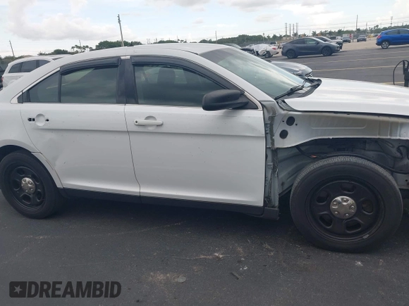 2015 Ford Police Interceptor with VIN 1FAHP2L83FG149326, listed as a IAAI auction lot 42477215 with 90,679 mi miles and . Bid and sale history available at DreamBid. Image 19.