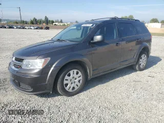 2014 Dodge Journey American Value with VIN 3C4PDCABXET277897, listed as a Copart auction lot 60566735 with 113,343 mi miles and Salvage title. Bid and sale history available at DreamBid. Image 1.