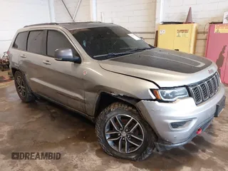 2017 Jeep Grand Cherokee Trailhawk with VIN 1C4RJFLG3HC793112, listed as a IAAI auction lot 42251892 with 124,054 mi miles and . Bid and sale history available at DreamBid. Image 1.