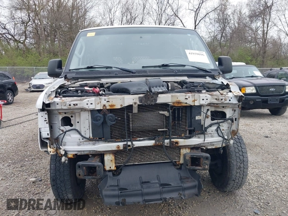 2012 Ford Econoline Cargo Commercial with VIN 1FTNE1EW0CDB10750, listed as a IAAI auction lot 41939696 with 180,042 mi miles. Bid and sale history available at carsss.com. Image 13.