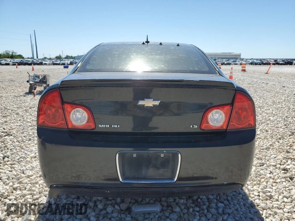 2009 Chevrolet Malibu 1LS with VIN 1G1ZG57B79F259000, listed as a Copart auction lot 53982655 with 153,151 mi miles and Salvage Title. Bid and sale history available at DreamBid. Image 6.