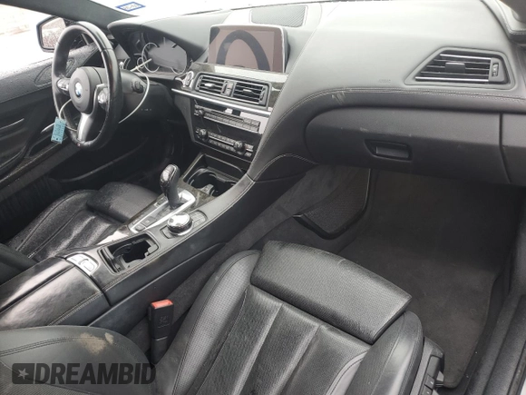 2017 BMW 6 Series z VIN WBA6H5C3XHG238010, wystawiony jako Copart lot #87314274 z przebiegiem 69 607 mil mil oraz Szkoda całkowita • Salvage title. Historia ofert i sprzedaży dostępna na DreamBid. Obrazek 8.