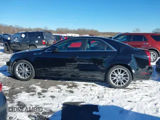 2013 Cadillac CTS Premium z VIN 1G6DS5E34D0160676, wystawiony jako IAAI lot #41262795 z przebiegiem 122 248 mil mil oraz . Historia ofert i sprzedaży dostępna na DreamBid. Obrazek 14.