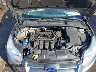 2013 Ford Focus SE with VIN 1FADP3K28DL323879, listed as a IAAI auction lot 41449022 with 133,735 mi miles. Bid and sale history available at carsss.com. Image 10.