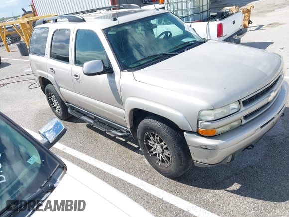 2005 Chevrolet Tahoe LT z VIN 1GNEK13T35R196103, wystawiony jako IAAI lot #42053184 z przebiegiem 326 536 mil mil oraz . Historia ofert i sprzedaży dostępna na DreamBid. Obrazek 1.