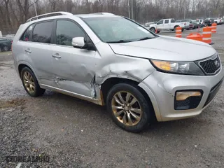 2013 Kia Sorento SX with VIN 5XYKWDA29DG342965, listed as a IAAI auction lot 41001039 with 163,760 mi miles. Bid and sale history available at carsss.com. Image 1.