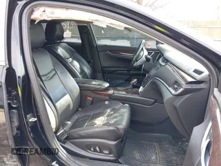 2015 Cadillac XTS Luxury z VIN 2G61N5S35F9155543, wystawiony jako IAAI lot #41699914 z przebiegiem 120 700 mil mil oraz . Historia ofert i sprzedaży dostępna na DreamBid. Obrazek 5.