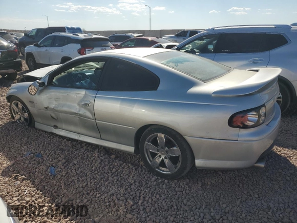 2006 Pontiac GTO z VIN 6G2VX12U86L519612, wystawiony jako Copart lot #73336964 z przebiegiem 122 003 mil mil oraz Szkoda całkowita • Salvage title. Historia ofert i sprzedaży dostępna na DreamBid. Obrazek 2.