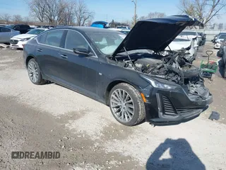 2024 Cadillac CT5 Premium Luxury z VIN 1G6DT5RW6R0108393, wystawiony jako IAAI lot #41404644 z przebiegiem 10 370 mil mil oraz . Historia ofert i sprzedaży dostępna na DreamBid. Obrazek 1.