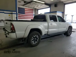 2015 Toyota Tacoma with VIN 3TMMU4FN2FM086482, listed as a Copart auction lot 57124365 with 211,638 mi miles and Salvage title. Bid and sale history available at DreamBid. Image 3.
