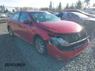 2014 Toyota Camry L with VIN 4T4BF1FK7ER356016, listed as a IAAI auction lot 41997772 with 124,962 mi miles. Bid and sale history available at carsss.com. Image 1.