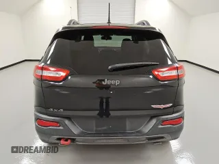 2015 Jeep Cherokee Trailhawk with VIN 1C4PJMBSXFW746138, listed as a Copart auction lot 49877985 with 86,820 mi miles and Clean Title. Bid and sale history available at carsss.com. Image 6.
