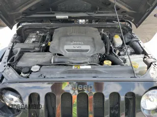 2015 Jeep Wrangler Freedom Edition with VIN 1C4AJWAG8FL688255, listed as a Copart auction lot 59722165 with 130,666 mi miles and Salvage title. Bid and sale history available at DreamBid. Image 12.