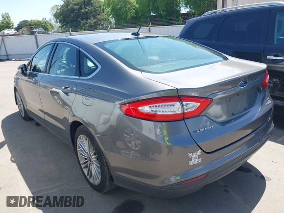 2014 Ford Fusion SE Hybrid with VIN 3FA6P0LU9ER142204, listed as a IAAI auction lot 41964308 with 177,499 mi miles. Bid and sale history available at carsss.com. Image 3.