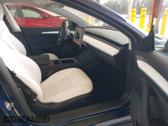 2022 Tesla Model 3 Long Range with VIN 5YJ3E1EB3NF267365, listed as a IAAI auction lot 41996594 with 32,687 mi miles and . Bid and sale history available at DreamBid. Image 5.