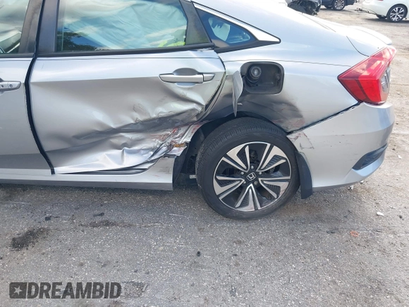 2017 Honda Civic EX-T with VIN 19XFC1F39HE001756, listed as a IAAI auction lot 42030331 with 44,056 mi miles. Bid and sale history available at carsss.com. Image 6.