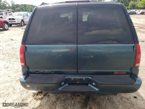 1999 GMC Denali with VIN 1GKEK13R5XR906686, listed as a Copart auction lot 64451994 with 273,180 mi miles and Salvage Title. Bid and sale history available at carsss.com. Image 6.