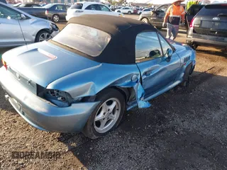 1996 BMW 3 Series Z3 1.9 with VIN 4USCH7324TLB70163, listed as a IAAI auction lot 41754480 with 128,783 mi miles and . Bid and sale history available at carsss.com. Image 4.