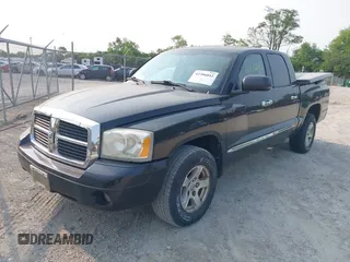 2007 Dodge Dakota SLT z VIN 1D7HW48K97S138512, wystawiony jako IAAI lot #42386042 z przebiegiem 146 629 mil mil oraz . Historia ofert i sprzedaży dostępna na DreamBid. Obrazek 2.
