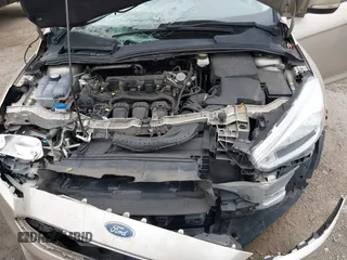 2017 Ford Focus SE with VIN 1FADP3F28HL252411, listed as a IAAI auction lot 41888738 with 103,981 mi miles. Bid and sale history available at carsss.com. Image 10.