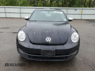 2012 Volkswagen Beetle Turbo z VIN 3VWVA7AT0CM605378, wystawiony jako Copart lot #58641085 z przebiegiem 114 422 mil mil oraz Tytuł czysty. Historia ofert i sprzedaży dostępna na DreamBid. Obrazek 5.