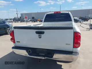 2007 Dodge 1500 SLT with VIN 1D7HA16PX7J579891, listed as a IAAI auction lot 42030399 with 202,781 mi miles and . Bid and sale history available at DreamBid. Image 16.