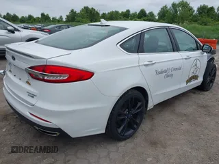 2020 Ford Fusion Titanium with VIN 3FA6P0D94LR133269, listed as a IAAI auction lot 42607013 with 89,406 mi miles and . Bid and sale history available at DreamBid. Image 4.
