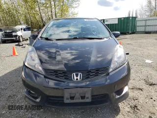 2012 Honda Fit Sport with VIN JHMGE8H58CC013885, listed as a Copart auction lot 53052205 with 144,182 mi miles and Salvage Title. Bid and sale history available at carsss.com. Image 5.