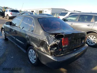 1997 Honda Civic EX with VIN 2HGEJ8645VH566736, listed as a IAAI auction lot 41876647 with 277,968 mi miles. Bid and sale history available at carsss.com. Image 3.