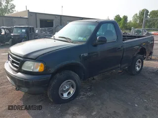 2003 Ford F-150 XL with VIN 2FTRF18243CB08751, listed as a IAAI auction lot 42456956 with 130,805 mi miles and . Bid and sale history available at DreamBid. Image 2.