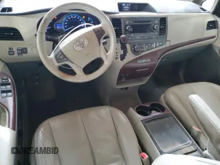 2012 Toyota Sienna XLE AAS с VIN 5TDYK3DCXCS202381, выставлен на аукционе Copart как лот 59002895 с пробегом 272 415 миль миль и Списание • Salvage title. История ставок и продаж доступна на DreamBid. Изображение 8.