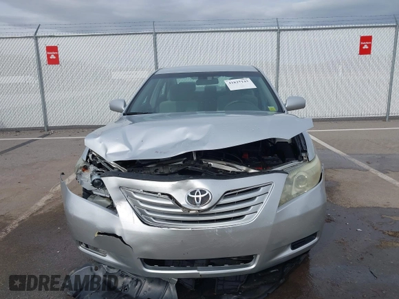 2009 Toyota Camry LE with VIN 4T1BK46K39U581157, listed as a IAAI auction lot 41827143 with 107,664 mi miles. Bid and sale history available at carsss.com. Image 13.
