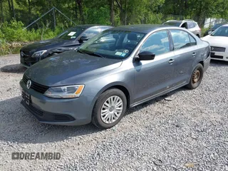2014 Volkswagen Jetta S with VIN 3VW2K7AJ2EM352047, listed as a IAAI auction lot 42556420 with 104,798 mi miles and . Bid and sale history available at DreamBid. Image 2.