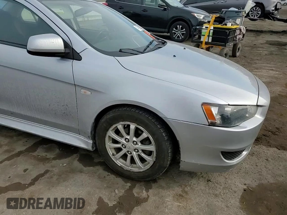2012 Mitsubishi Lancer ES z VIN JA32U2FU3CU023450, wystawiony jako Copart lot #47019525 z przebiegiem Nie podano mil oraz Szkoda całkowita • Salvage title. Historia ofert i sprzedaży dostępna na DreamBid. Obrazek 11.