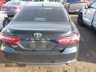 2020 Toyota Camry LE with VIN 4T1C11AK0LU864863, listed as a IAAI auction lot 41748371 with 82,063 mi miles and . Bid and sale history available at carsss.com. Image 16.