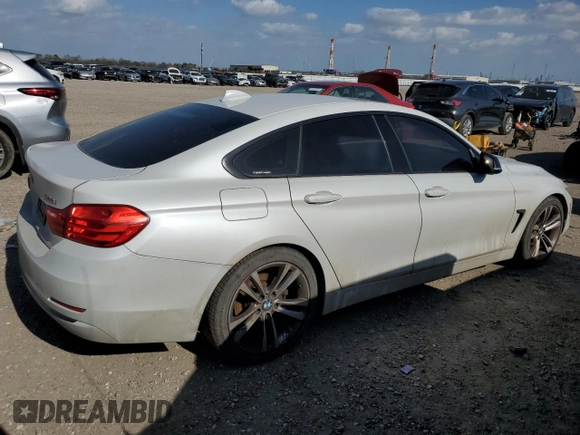 2015 BMW 4 Series 428i with VIN WBA4A5C5XFD410290, listed as a Copart auction lot 49067335 with 165,283 mi miles and Clean Title. Bid and sale history available at DreamBid. Image 3.