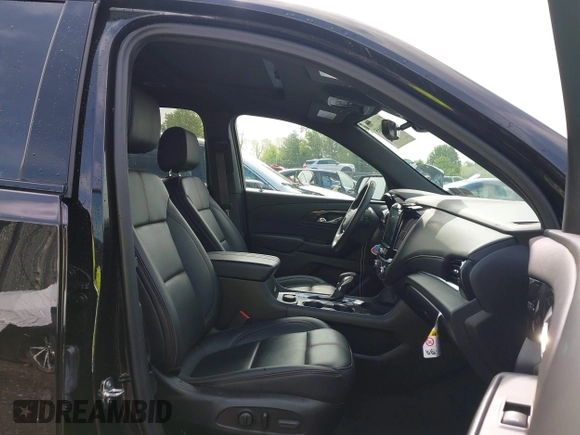 2023 Chevrolet Traverse RS z VIN 1GNEVJKWXPJ290497, wystawiony jako IAAI lot #42200665 z przebiegiem 50 140 mil mil oraz . Historia ofert i sprzedaży dostępna na DreamBid. Obrazek 5.