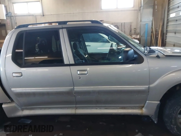 2004 Ford Explorer Sport Trac XLS z VIN 1FMZU77K84UB99207, wystawiony jako IAAI lot #41621860 z przebiegiem 126 634 mil mil oraz . Historia ofert i sprzedaży dostępna na DreamBid. Obrazek 14.